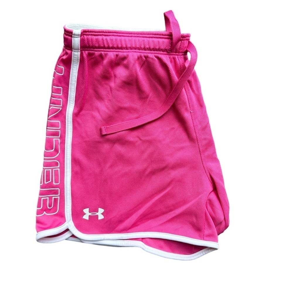 Under Amour woman’s workout shorts in pink  . Size small